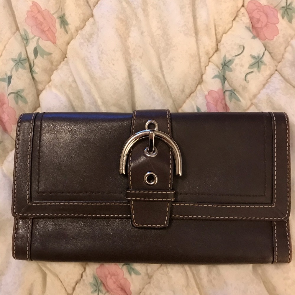 Brown Coach leather buckle wallet
